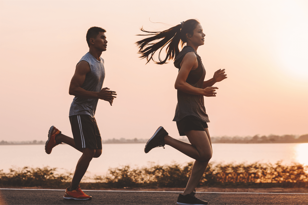 two people running