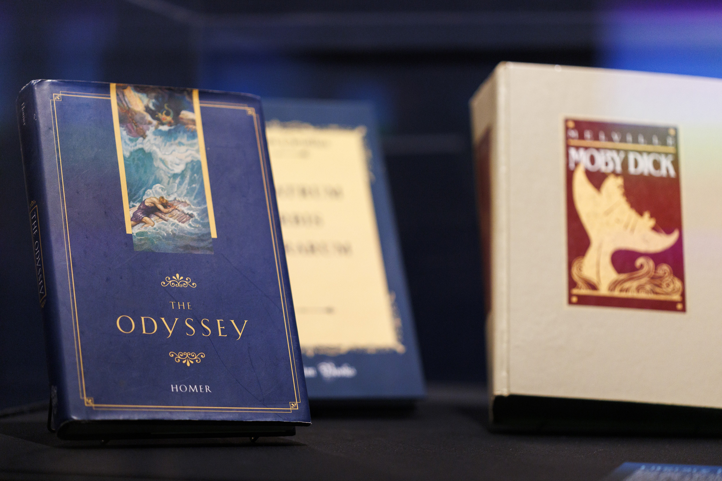 Literary volumes of Homer’s Odyssey and Melville’ Moby Dick are on display.