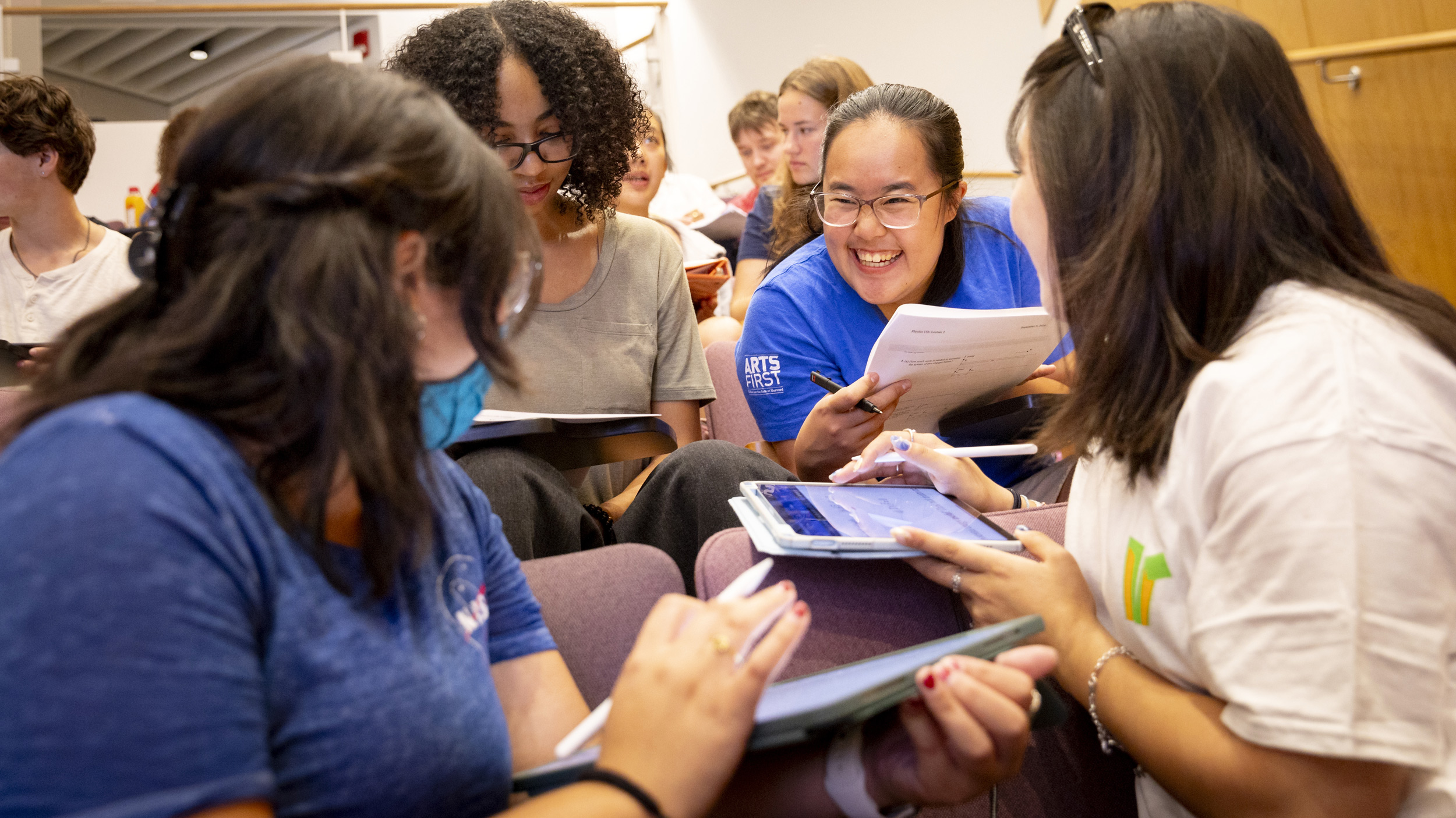 Victoria Zambrano ’27 (clockwise from bottom left), JaKayla C. Harris ’27, Ida Chen ’27, and Kodi Kim ’27 working together during “Introductory Electromagnetism Physics.”