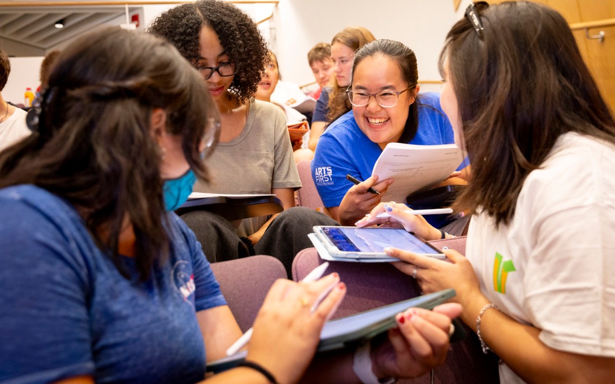 Victoria Zambrano ’27 (clockwise from bottom left), Ja Kayla C Harris ’27, Ida Chen ’27, and Caroline Kim working together during Introductory Electromagnetism Physics.