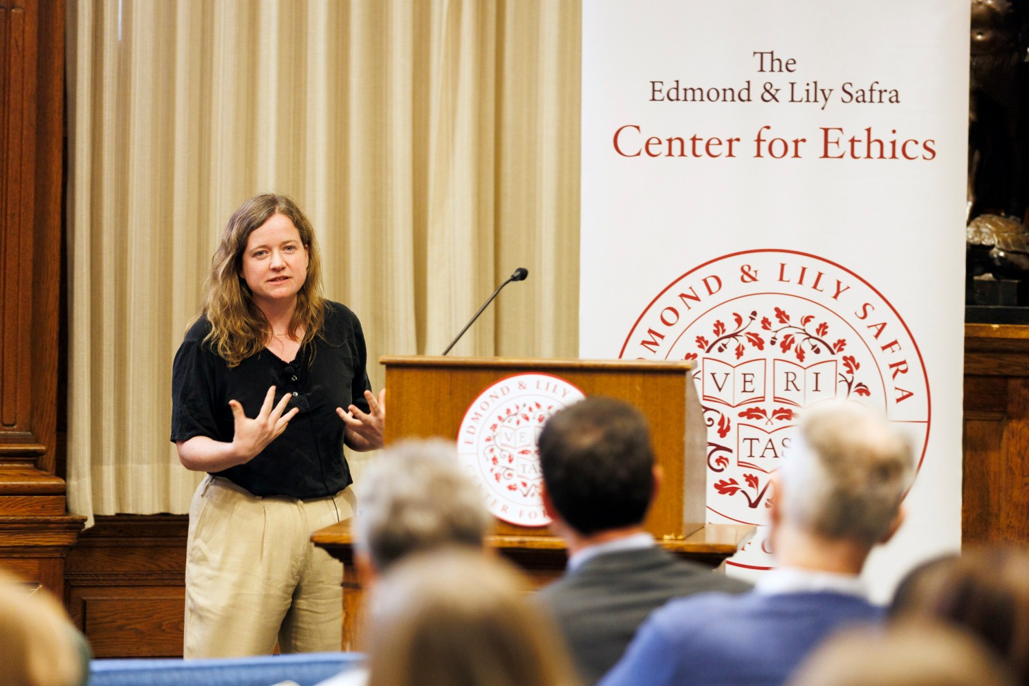 Emily McTernan  speaking the Barker Center before an audience.