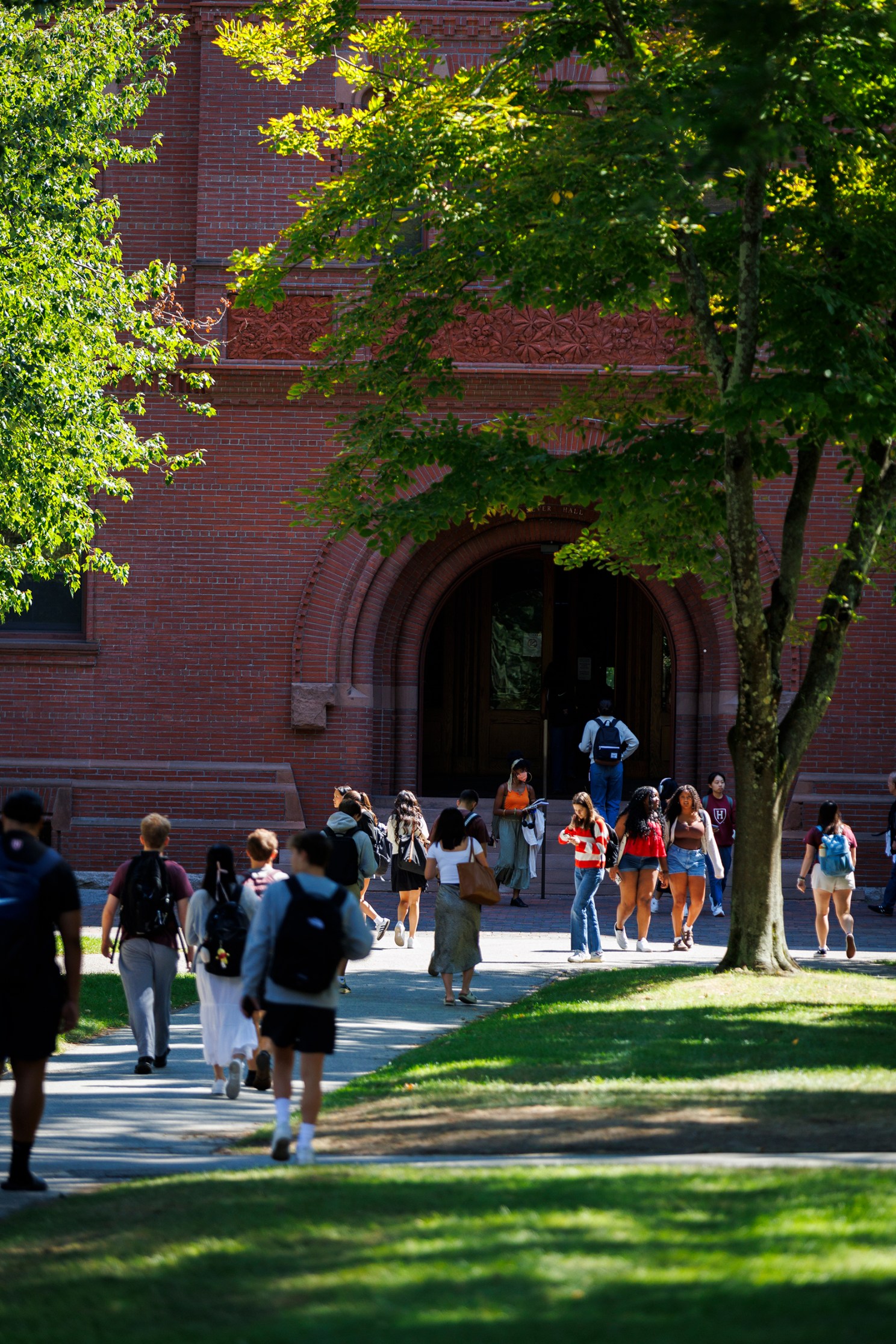 Students pass through Harvard Yard near Sever Hall during the first week of classes.