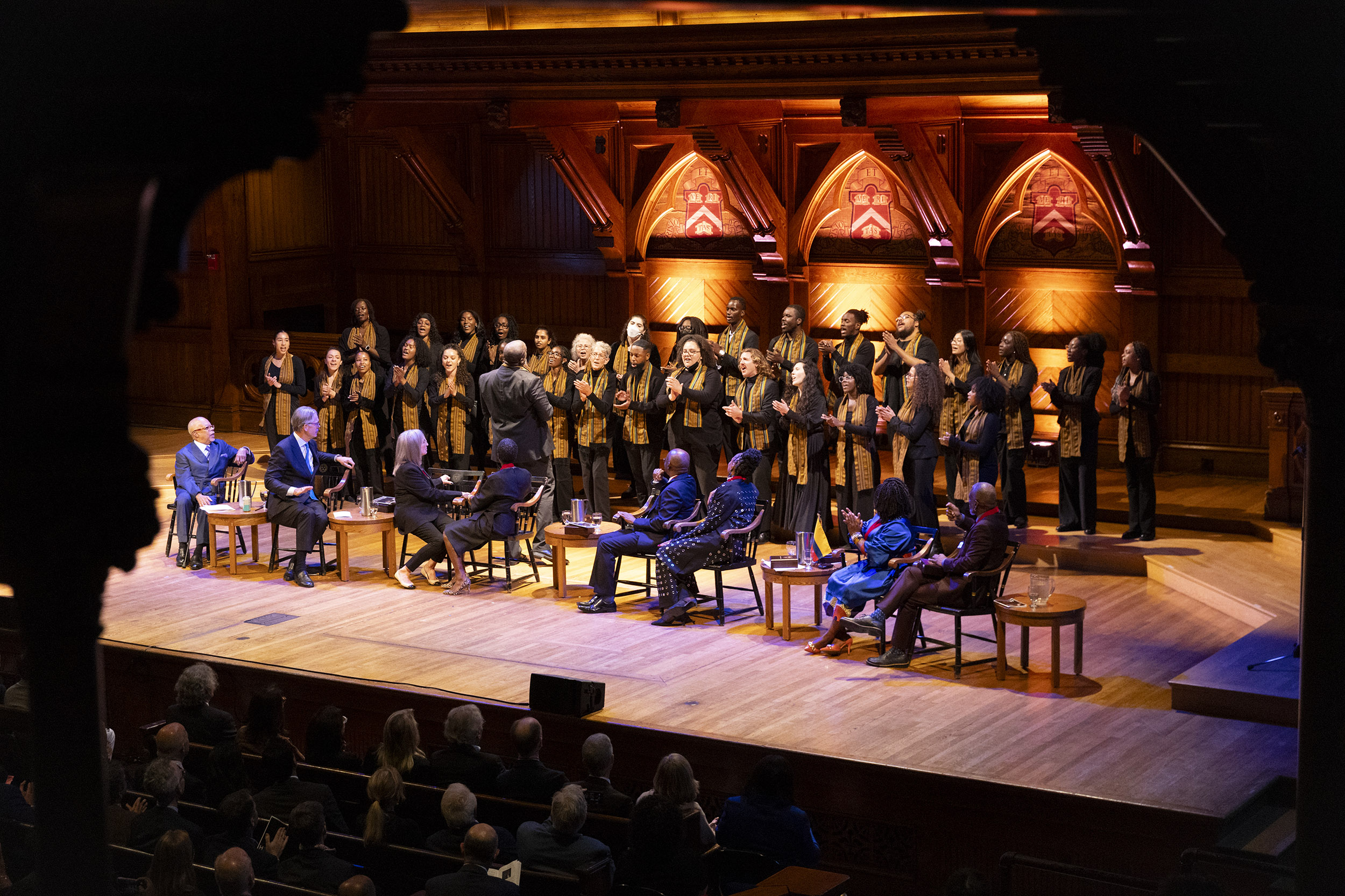 Kuumba singers perform on stage alongside Du Boid Medalists.