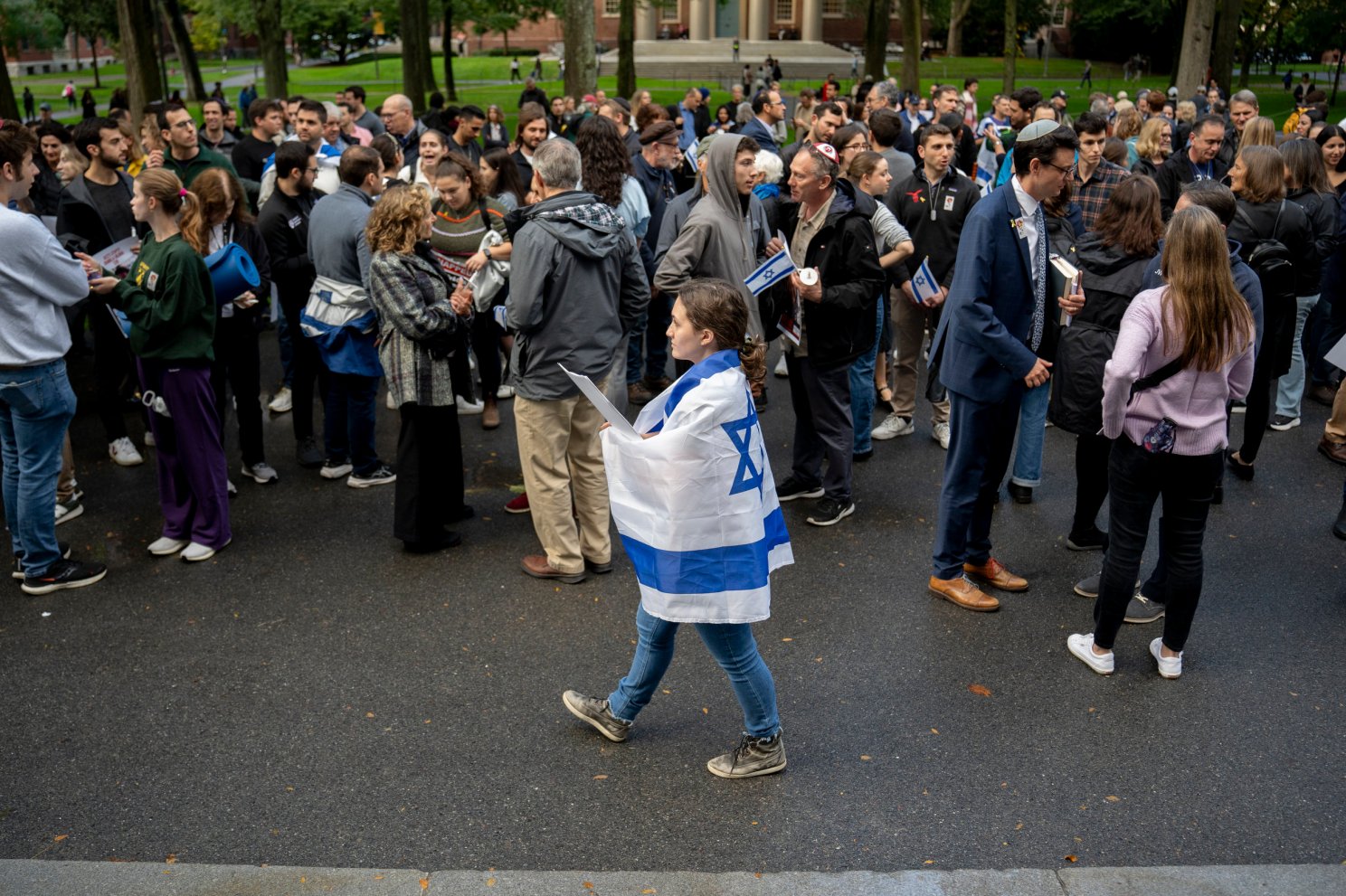 Harvard community joins vigil.