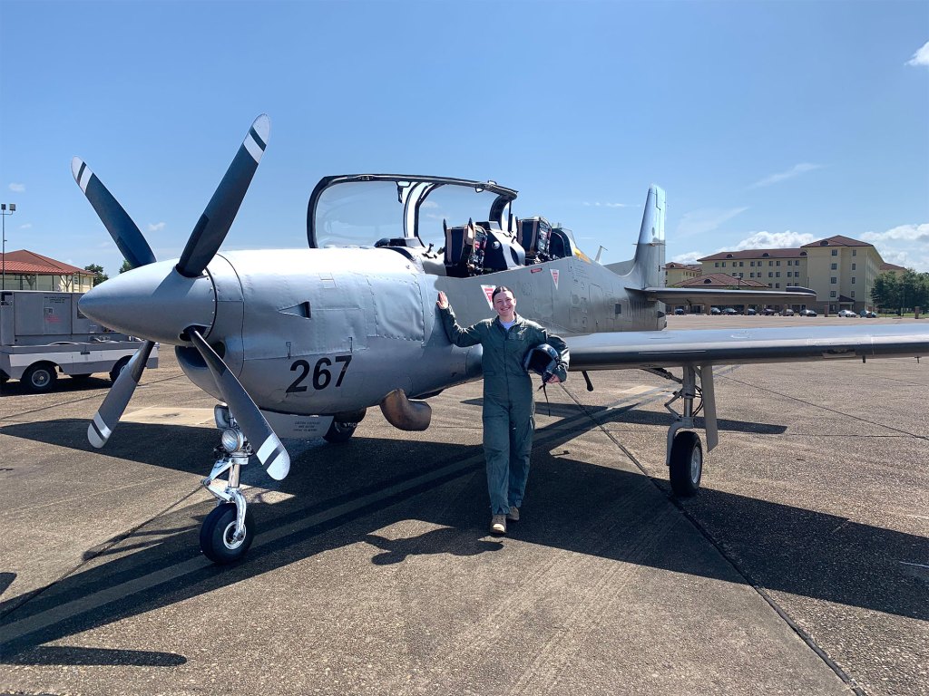 Faith Schmidt with an old plane.