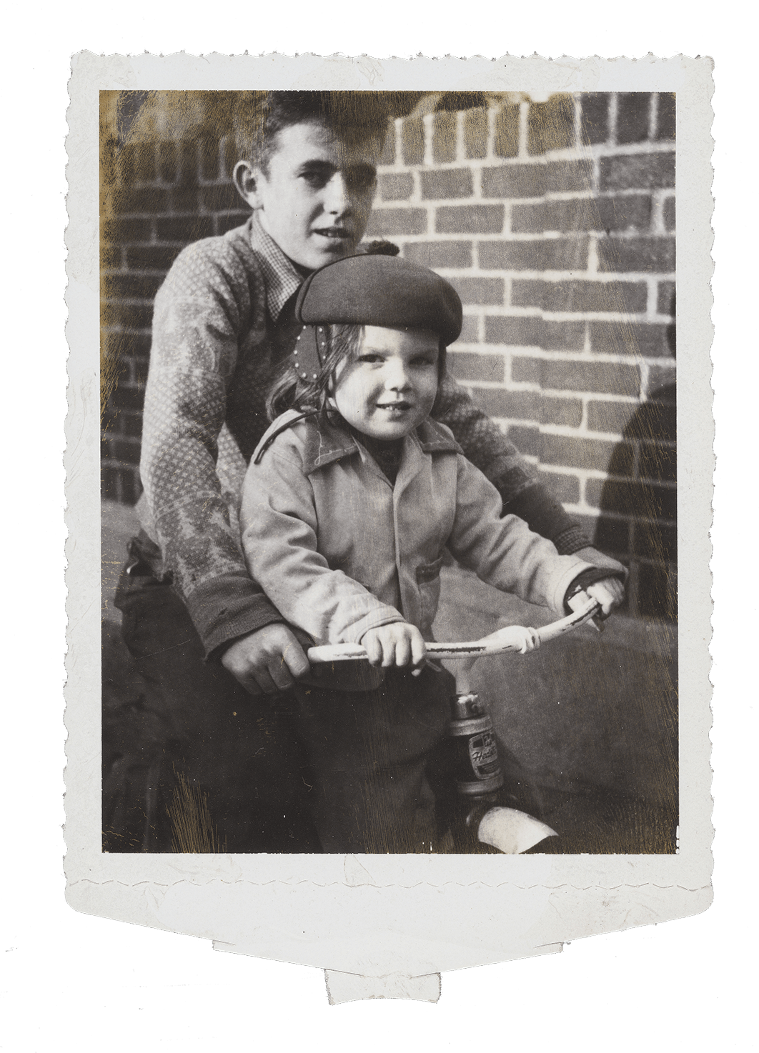 Two children on a bicycle. 