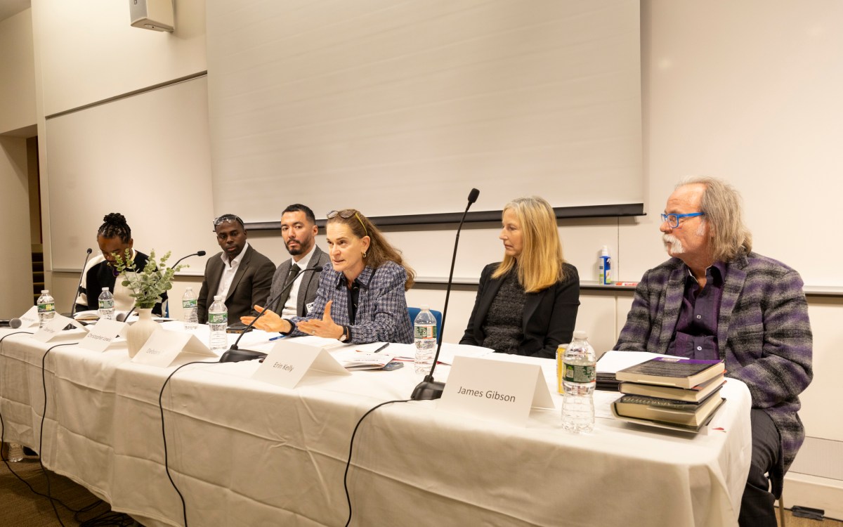 Marcus Hunter (from left), Daniel Fryer, Christopher Lewis, Debora Spar, Erin Kelly, and James Gibson speaking during the event. Photos of a panel from the CRISES “Are Reparations the Answer?” Conference held in William James Hall B1 at Harvard University. The panel is titled “Redefining Justice: Moral, Ethical, and Political Dilemmas in Addressing Reparations and Racial Justice,” and features Daniel Fryer, Assistant Professor of Law and Philosophy at the University of Michigan, Christopher Lewis, Assistant Professor at Harvard Law School, James Gibson, Sidney W. Souers Professor of Government at Washington University in St. Louis, Debora Spar, Jaime and Josefina Chua Tiampo Professor of Business Administration at Harvard Business School, and Erin Kelly, Fletcher Professor of Philosophy at Tufts University. Marcus Hunter, Scott Waugh Endowed Chair in the Social Sciences Division, Professor of Sociology & African American Studies at the University of California Los Angeles, is the panel’s discussant.