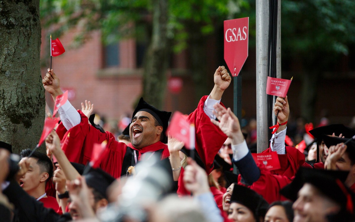 Graduates celebrate as their School is announced.