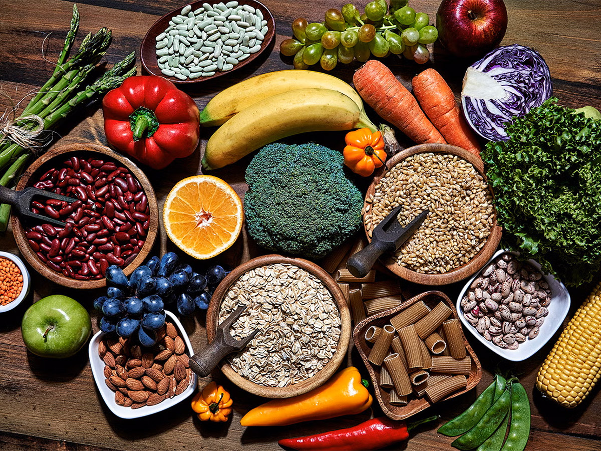 A collection of healthy fruits, vegetables, grains.
