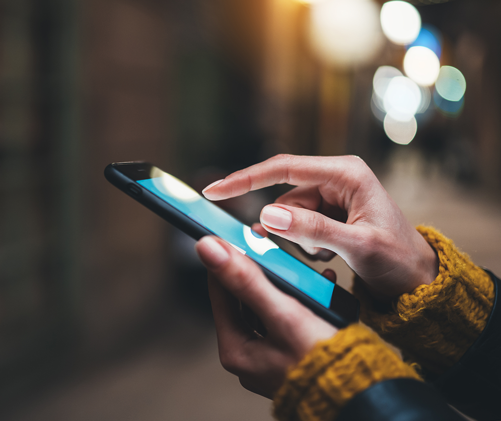 person scrolling on phone