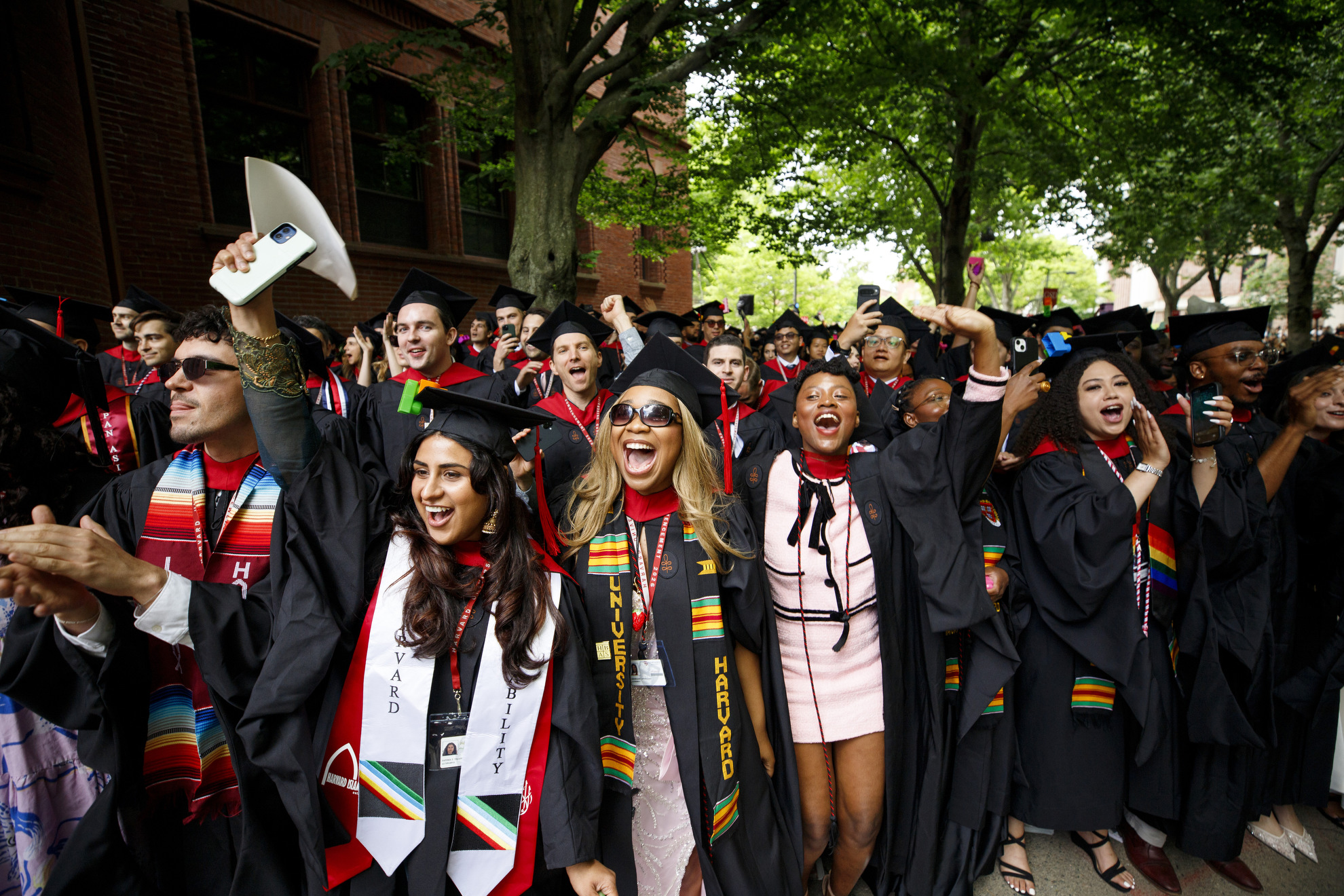 Graduates from Harvard Graduate School of Design celebrate. 